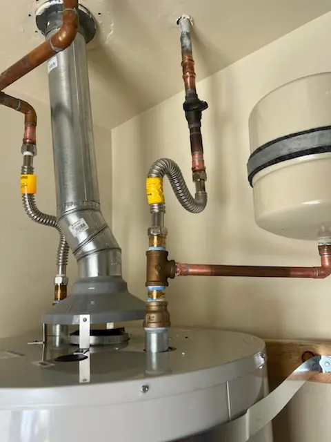 Water heater installation and plumbing repair in Churchill Downs