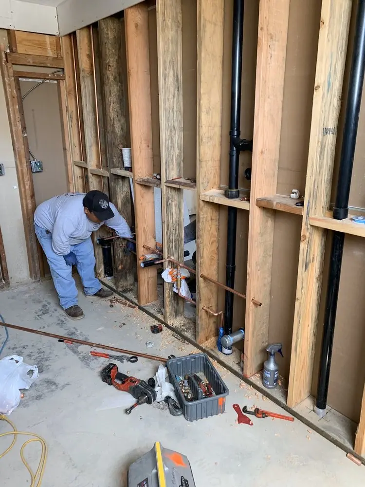 Commercial rough-in plumbing for Water Heater Replacement in Churchill Downs